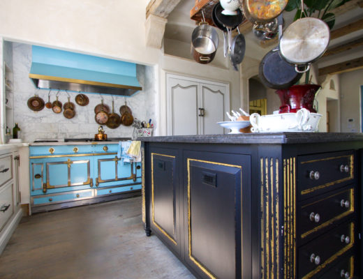 turquoise oven, gold inlay, blue cabinets
